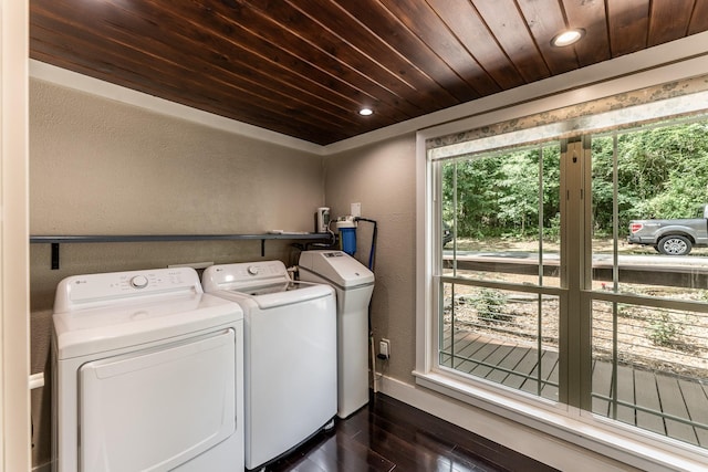 44 Post Oak Dr, Huntsville, TX 77320 - laundry room featuring separate washer and dryer, wooden ceiling, dark wood-type flooring, a textured wall, and recessed lighting