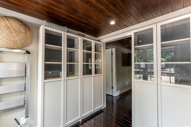 44 Post Oak Dr, Huntsville, TX 77320 - unfurnished dining area featuring wood ceiling, dark wood finished floors, and recessed lighting