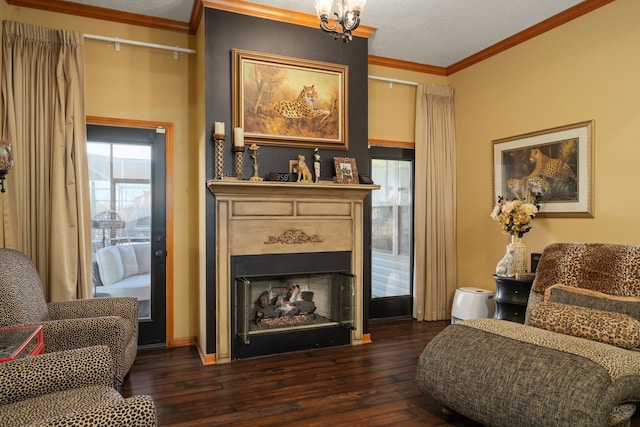 1802 Snow Goose Ln, Katy, TX 77493 - living room featuring ornamental molding, a fireplace, dark wood-style floors, a chandelier, and baseboards