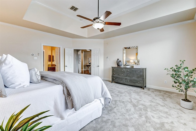 4706 Payton Chase Ln, Katy, TX 77494 - bedroom with a raised ceiling, carpet flooring, crown molding, baseboards, and connected bathroom