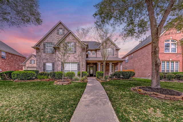 4706 Payton Chase Ln, Katy, TX 77494 - traditional-style house featuring a front lawn and a standing seam roof