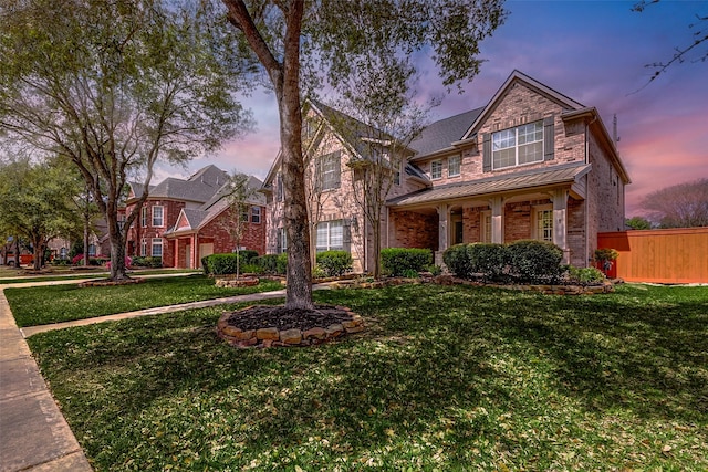 4706 Payton Chase Ln, Katy, TX 77494 - traditional home with a standing seam roof and brick siding