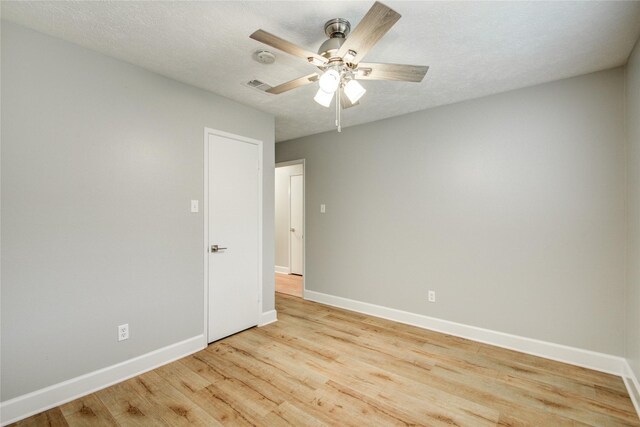 2706 Williams Grant St, Sugar Land, TX 77479 - unfurnished room with baseboards, light wood-type flooring, a ceiling fan, and a smoke detector