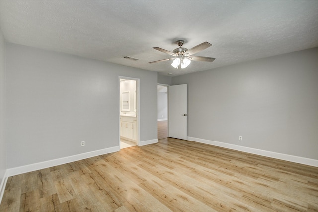 2706 Williams Grant St, Sugar Land, TX 77479 - empty room featuring baseboards, light wood finished floors, and a ceiling fan