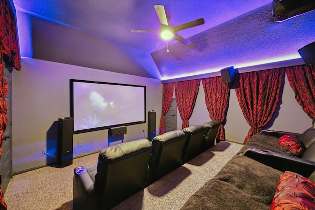 12226 Brighton Brook Ln, Tomball, TX 77377 - home theater room featuring carpet flooring, ceiling fan, a textured ceiling, lofted ceiling, and baseboards