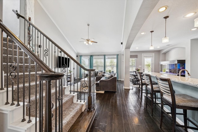 12226 Brighton Brook Ln, Tomball, TX 77377 - stairs with ceiling fan, hardwood / wood-style flooring, recessed lighting, baseboards, and ornamental molding