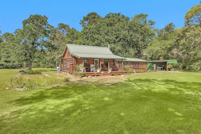 1356 Pegoda Ranch Rd, Woodlake, TX 75865 - rear view of property with a detached carport, a yard, log exterior, and metal roof