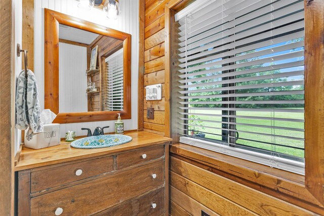 1356 Pegoda Ranch Rd, Woodlake, TX 75865 - bathroom with vanity and wood walls