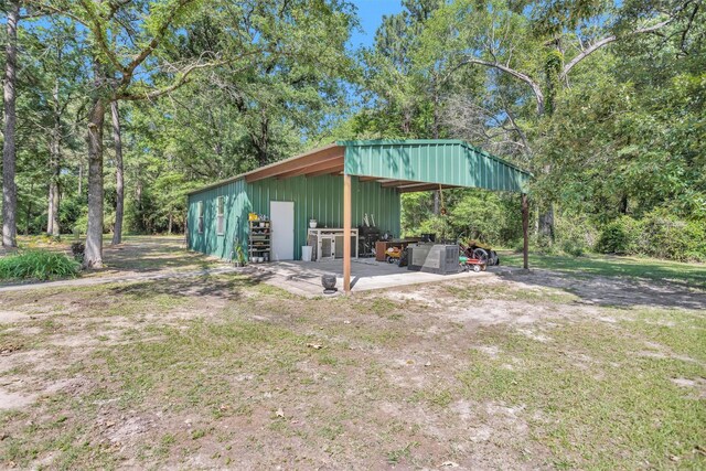 1356 Pegoda Ranch Rd, Woodlake, TX 75865 - view of pole building with a carport
