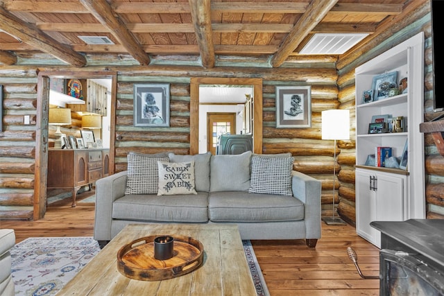 1356 Pegoda Ranch Rd, Woodlake, TX 75865 - living area with hardwood / wood-style floors, wooden ceiling with exposed beams, and rustic walls