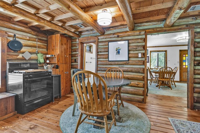 1356 Pegoda Ranch Rd, Woodlake, TX 75865 - dining room with hardwood / wood-style flooring, wood ceiling with exposed beams, and log walls