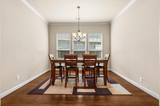 143 Jacks Corner Dr, Montgomery, TX 77316 - dining area featuring a chandelier, wood finished floors, baseboards, and ornamental molding