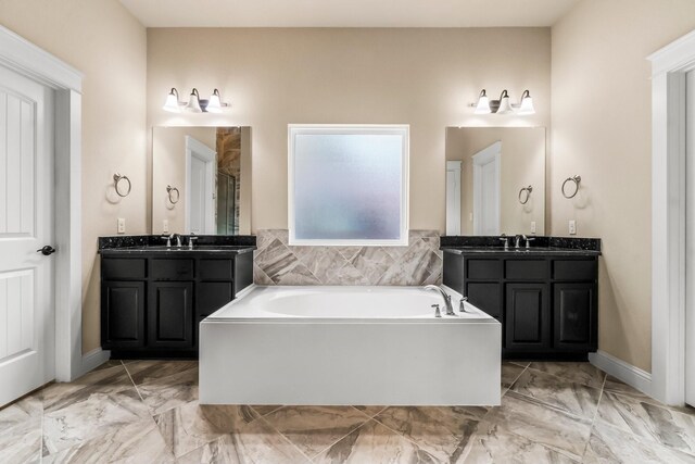 143 Jacks Corner Dr, Montgomery, TX 77316 - bathroom featuring a bath, two vanities, marble finish flooring, and a shower