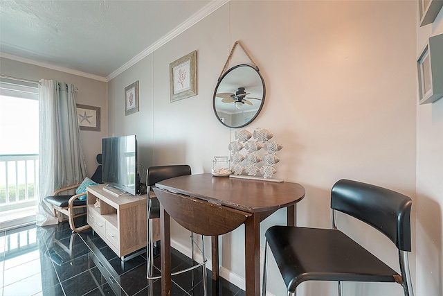 6102 Seawall Blvd Unit 252, Galveston, TX 77551 - office area featuring ornamental molding, a ceiling fan, and baseboards