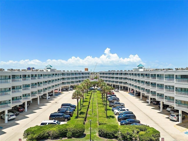 6102 Seawall Blvd Unit 252, Galveston, TX 77551 - view of building exterior featuring uncovered parking