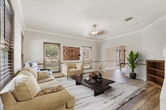 4910 Bayfair St, Pasadena, TX 77505 - living area with ornamental molding and wood finished floors