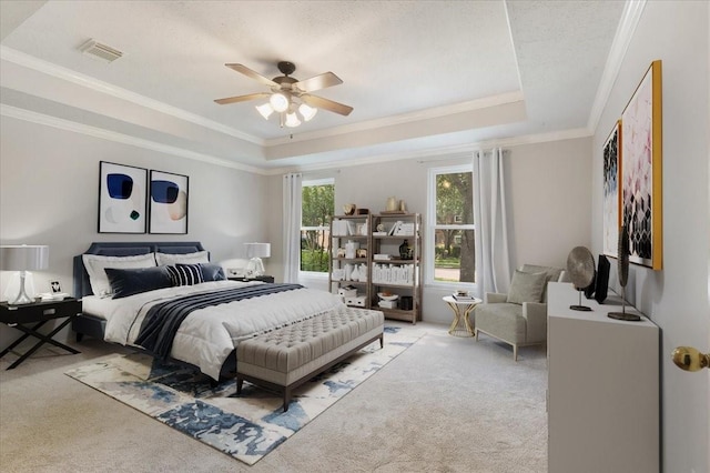 4910 Bayfair St, Pasadena, TX 77505 - carpeted bedroom with a raised ceiling, crown molding, and a ceiling fan