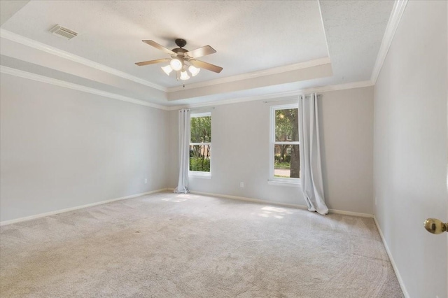 4910 Bayfair St, Pasadena, TX 77505 - unfurnished room with a raised ceiling, ceiling fan, light carpet, and ornamental molding