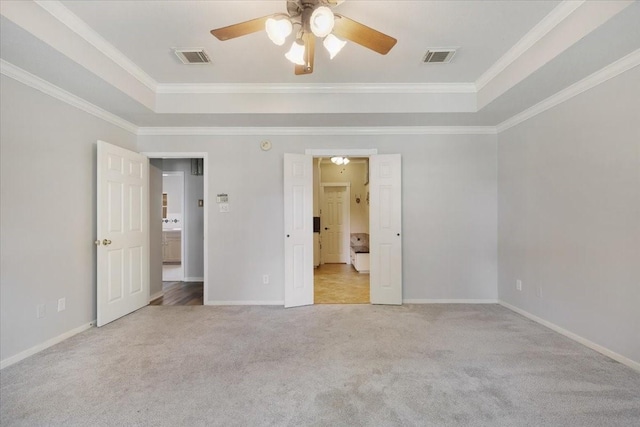 4910 Bayfair St, Pasadena, TX 77505 - unfurnished bedroom with carpet flooring, a raised ceiling, crown molding, and a ceiling fan