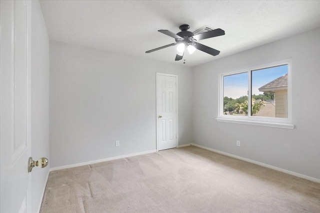 4910 Bayfair St, Pasadena, TX 77505 - carpeted empty room featuring baseboards and a ceiling fan