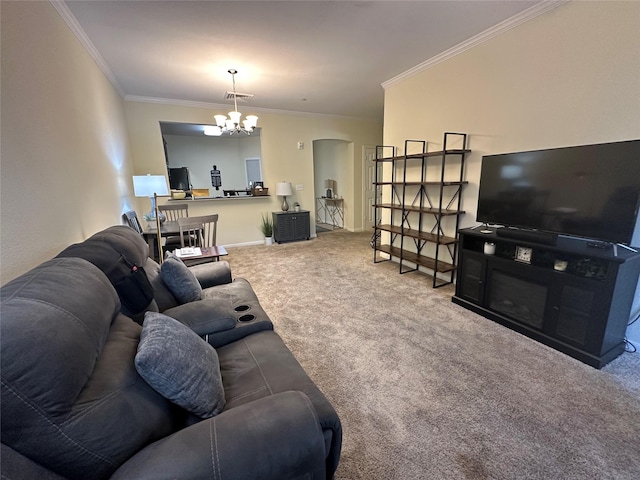 2815 Kings Crossing Dr Unit 308, Houston, TX 77345 - carpeted living room featuring ornamental molding, a chandelier, and baseboards