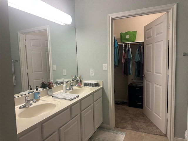 2815 Kings Crossing Dr Unit 308, Houston, TX 77345 - full bath with double vanity, tile patterned floors, and a spacious closet