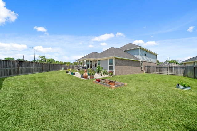 7410 Arabian Moon Trl, Fulshear, TX 77441 - view of yard with a patio