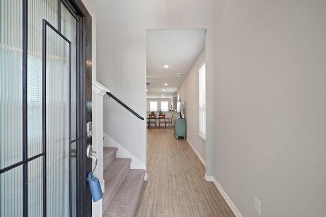 7410 Arabian Moon Trl, Fulshear, TX 77441 - entryway featuring stairs, light wood-style floors, recessed lighting, and baseboards