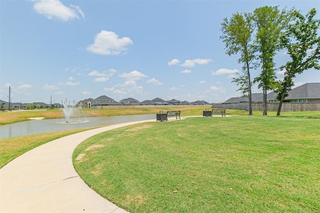 7410 Arabian Moon Trl, Fulshear, TX 77441 - view of home's community with a residential view and a water view