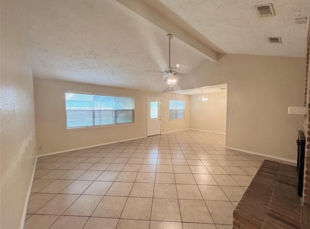 16307 Thistleglen Dr, Houston, TX 77095 - empty room with a textured ceiling, a ceiling fan, light tile patterned flooring, a brick fireplace, and baseboards
