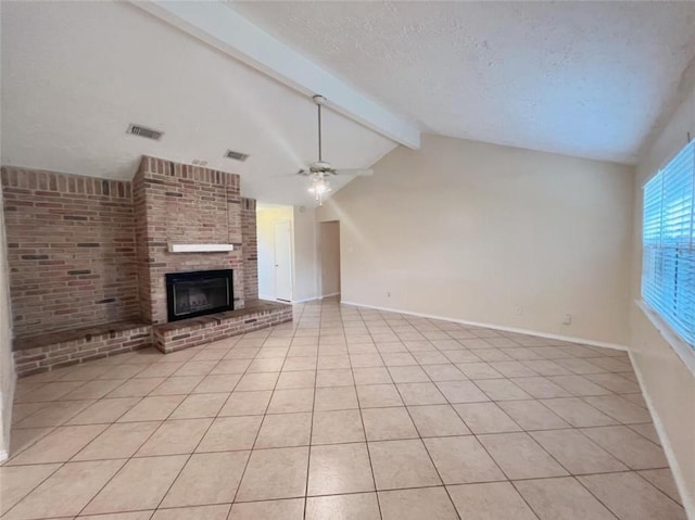 16307 Thistleglen Dr, Houston, TX 77095 - unfurnished living room featuring a ceiling fan, a fireplace, baseboards, light tile patterned floors, and a textured ceiling