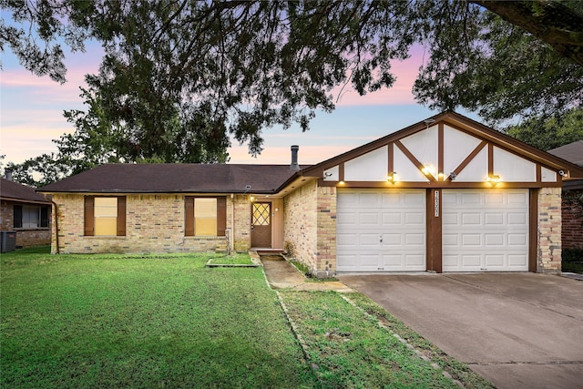 16307 Thistleglen Dr, Houston, TX 77095 - view of front of house featuring an attached garage, brick siding, a front lawn, and concrete driveway