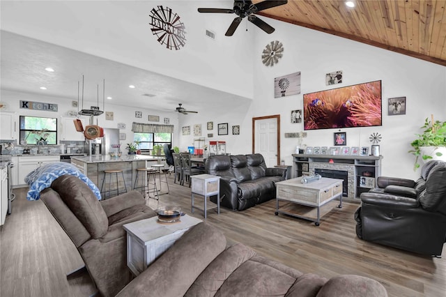 711 Forest Spgs, Livingston, TX 77351 - living area with a ceiling fan, recessed lighting, plenty of natural light, light wood finished floors, and wooden ceiling