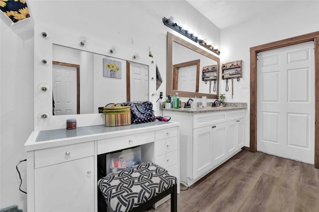711 Forest Spgs, Livingston, TX 77351 - bathroom featuring vanity and wood finished floors