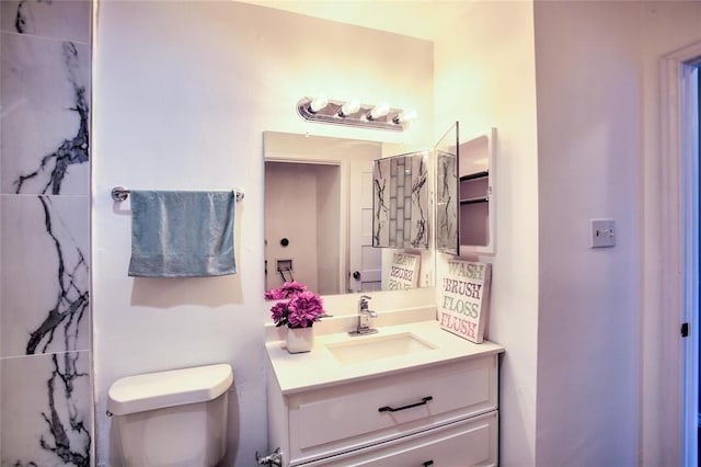 10075 Westpark Dr Unit 45, Houston, TX 77042 - bathroom featuring vanity and toilet