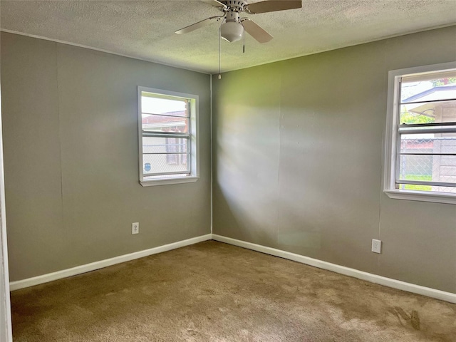3134 7th Ave N, Texas City, TX 77590 - spare room with healthy amount of natural light, carpet floors, a textured ceiling, and a ceiling fan