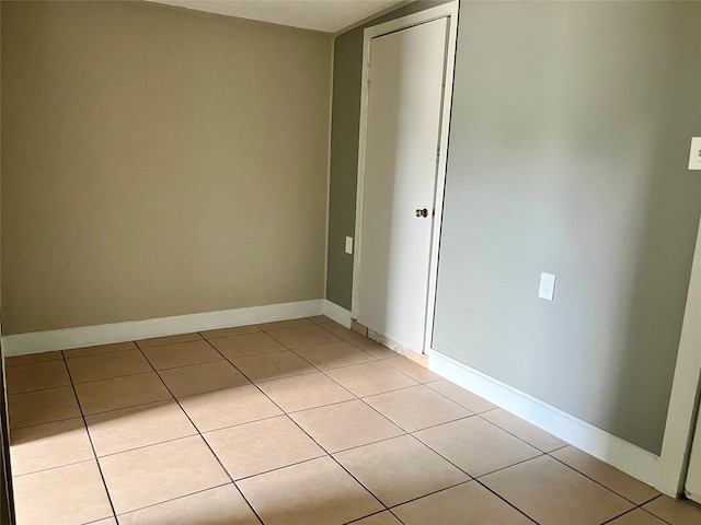 3134 7th Ave N, Texas City, TX 77590 - empty room featuring light tile patterned floors and baseboards