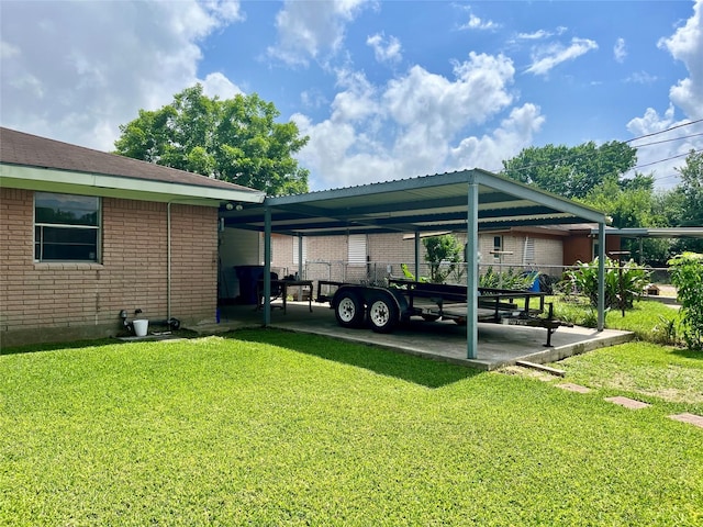 3134 7th Ave N, Texas City, TX 77590 - view of parking / parking lot featuring an attached carport