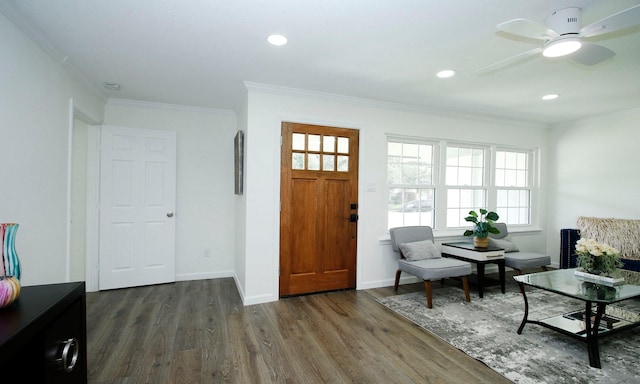 5313 De Lange Ln, Houston, TX 77092 - entrance foyer with ornamental molding, dark wood finished floors, ceiling fan, and recessed lighting