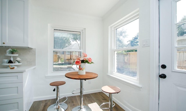 5313 De Lange Ln, Houston, TX 77092 - dining room with ornamental molding and dark wood-style flooring