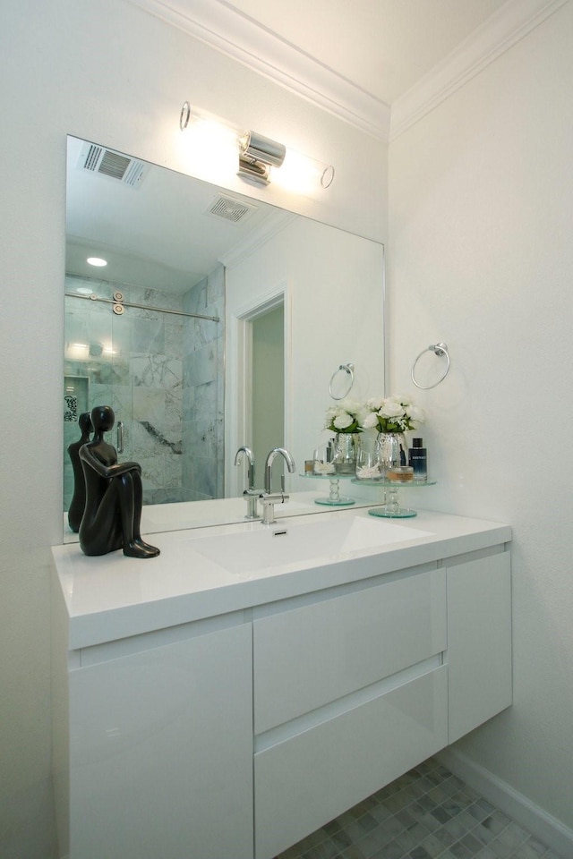 5313 De Lange Ln, Houston, TX 77092 - bathroom featuring ornamental molding, vanity, a marble finish shower, and tile patterned flooring