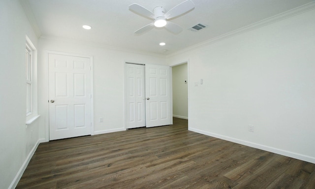 5313 De Lange Ln, Houston, TX 77092 - unfurnished bedroom featuring dark wood-style floors, baseboards, crown molding, and recessed lighting