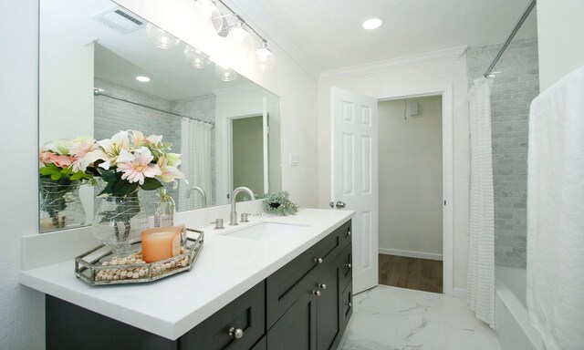 5313 De Lange Ln, Houston, TX 77092 - bathroom with ornamental molding, vanity, marble finish floors, shower / bath combo with shower curtain, and recessed lighting