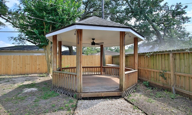 5313 De Lange Ln, Houston, TX 77092 - deck with ceiling fan, a fenced backyard, and a gazebo