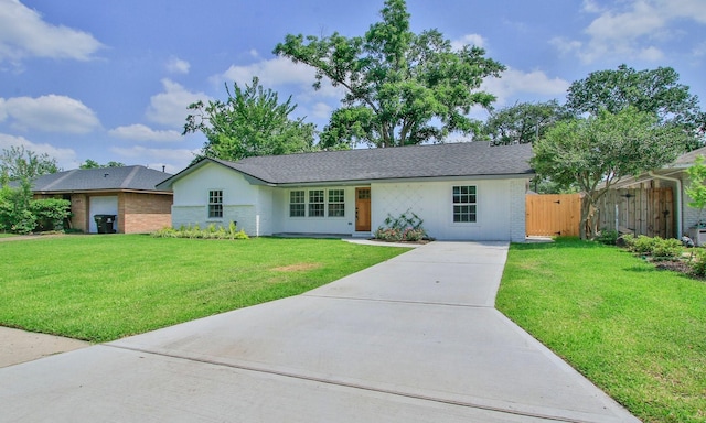 5313 De Lange Ln, Houston, TX 77092 - single story home with concrete driveway and brick siding
