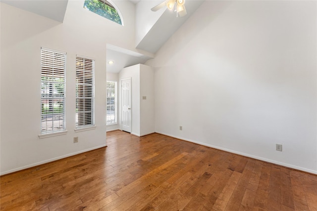 5515 Strack Rd Unit 101, Houston, TX 77069 - unfurnished room featuring wood-type flooring, ceiling fan, baseboards, and a high ceiling