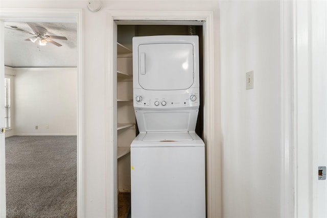 5515 Strack Rd Unit 101, Houston, TX 77069 - laundry room with estacked washer and dryer, a ceiling fan, carpet, and baseboards