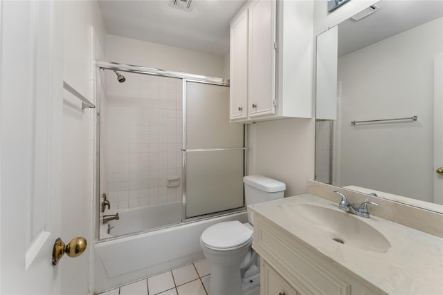5515 Strack Rd Unit 101, Houston, TX 77069 - full bath with tile patterned floors, vanity, toilet, and combined bath / shower with glass door