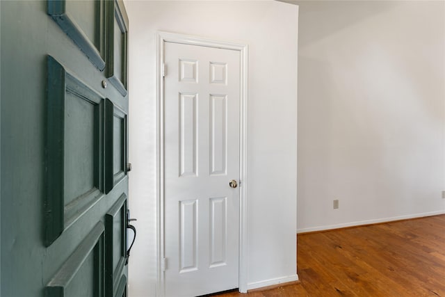 5515 Strack Rd Unit 101, Houston, TX 77069 - hallway featuring wood finished floors and baseboards