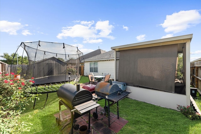 14135 Chelseahurst Ln, Houston, TX 77047 - view of yard featuring a trampoline